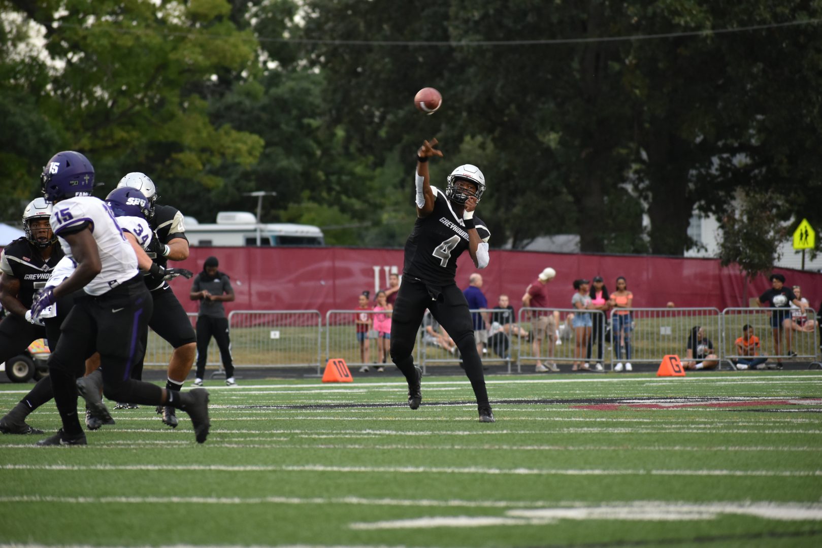 In this file photo, senior quarterback TJ Edwards throws the ball upfield during a home game against the Truman University Bulldogs on Nov. 9, 2019.