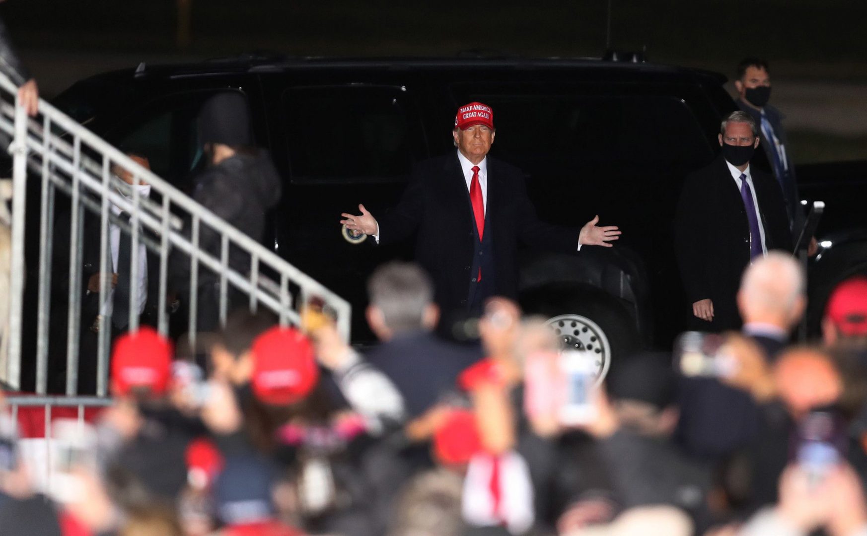 President Donald Trump arrives before speaking at a campaign rally at Southern Wisconsin Regional Airport in Janesville, Wisconsin on Saturday, Oct. 17, 2020.