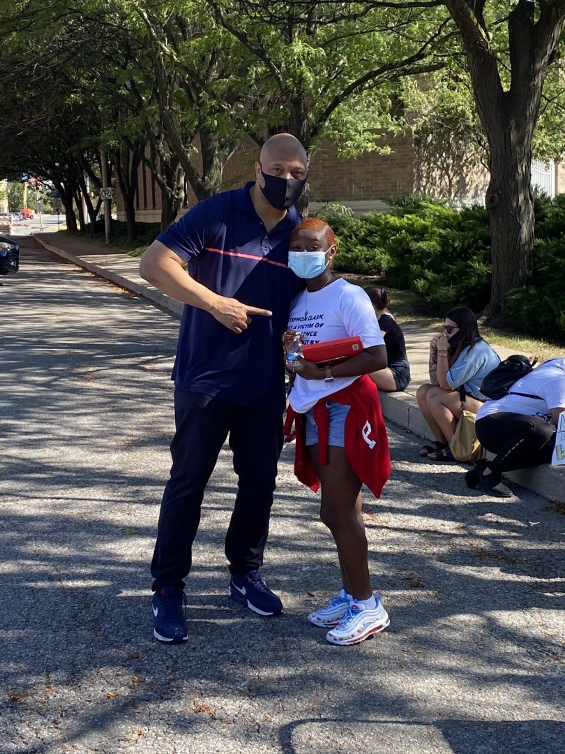 Staff Writer Tyshara Loynes poses with U.S Rep. André Carson, D-Indianapolis, during a sit-in for Black Lives Matter at Indiana Ave. in Downtown Indianapolis on Sept. 5, 2020.