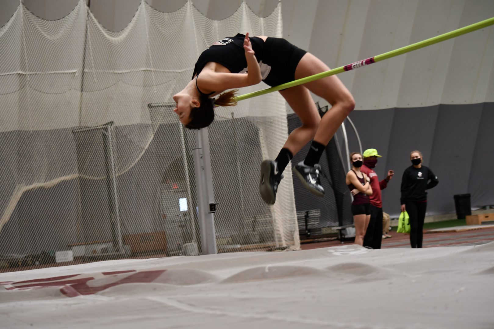 Senior jumper Taylor Strnad attempts a high jump of 1.70 meters which is a try at the UIndy women’s high jump indoor school record. Strnad won the event for the Greyhound invite with a jump of 1.65 meters. Senior jumper Chandler Martin got second with a 1.85m jump.