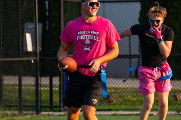 Two men practicing flag football