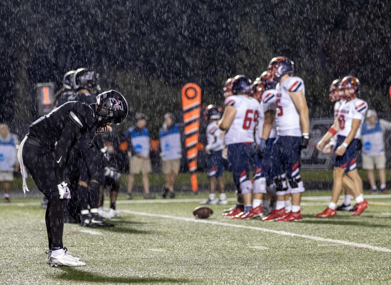 Football game in the rain