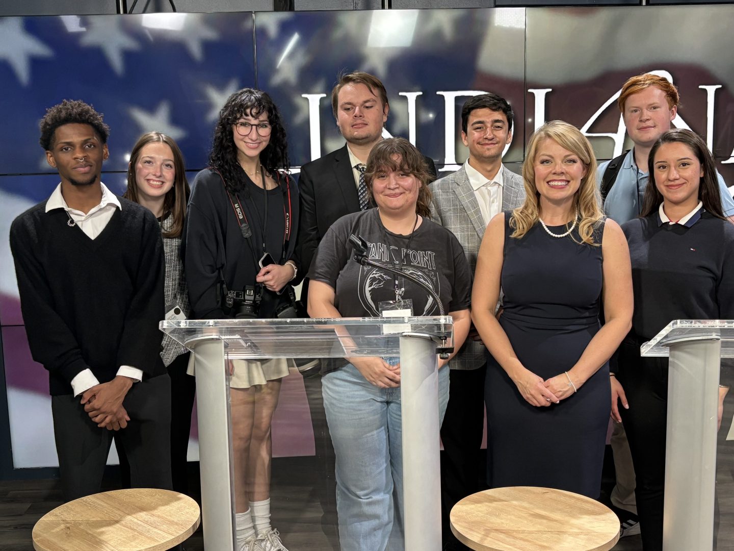 Dr. Wilson with students at the senate debate