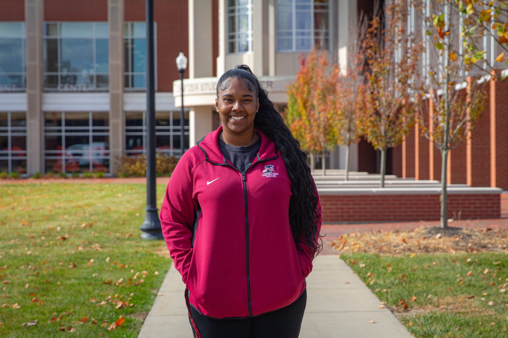 Makayla Hampton stands outside of student center for portrait 