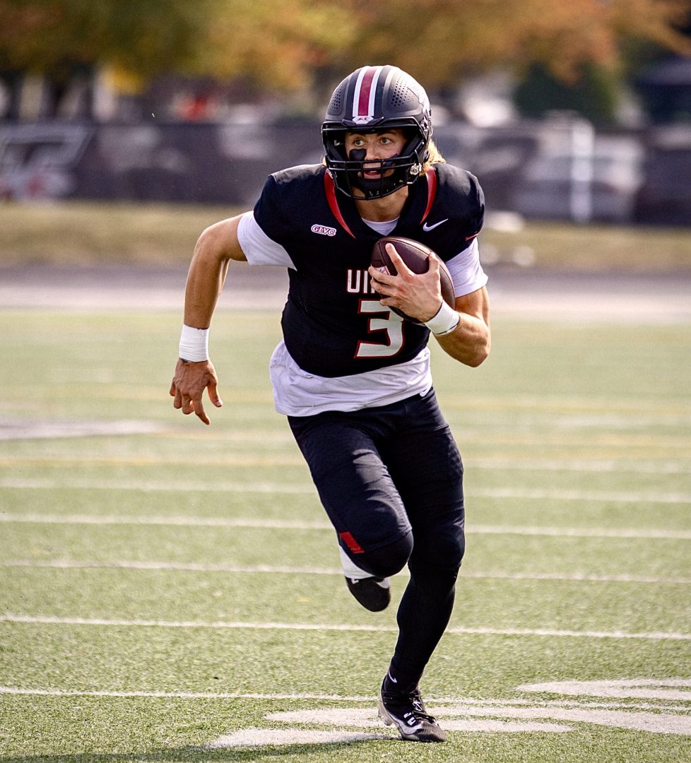 Gavin Sukup rushing for a first down against conference opponent Lincoln (Mo.)