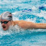 UIndy swimmer Jeremias Pock glides through the water for UIndy swim & dive