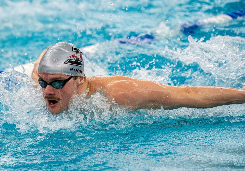 UIndy swimmer Jeremias Pock glides through the water for UIndy swim & dive