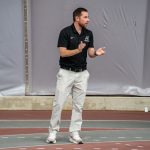 Director of Track and Field/Cross Country, Brad Robinson, cheering on his team in the 2026 GLVC indoor track and field championships.