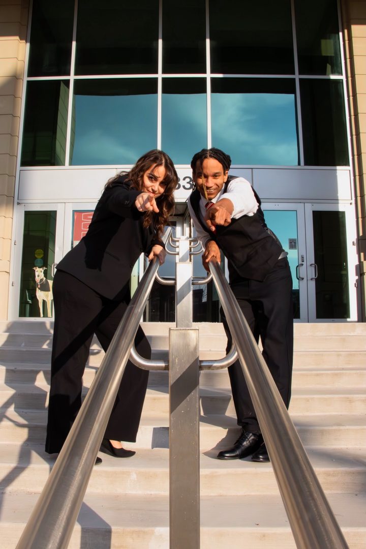 The new Student Government Association President and Vice President elects, Johara El-Shahat and Avery Allen, pose outside the front doors of Esch Hall. They will be taking over SGA leadership following the graduation of current SGA President, Jotan Johnson, in May.