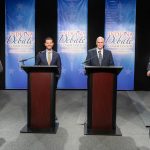Lauri Shillings, Max Engling, Greg Ballard, and Beau Bayh standing behind podiums at the Indiana Secretary of State debate.